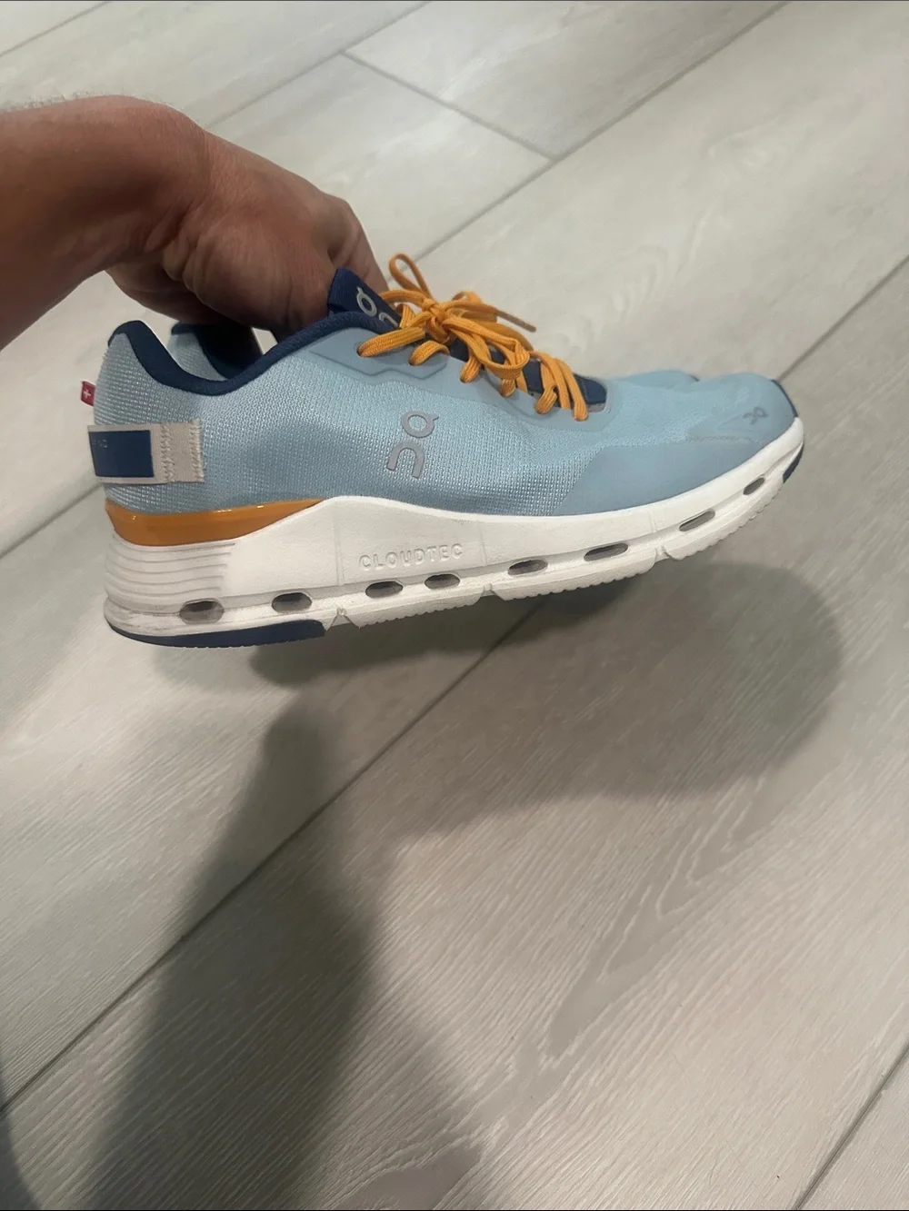 On Lightweight Women's Running Shoes in Light Blue and Orange